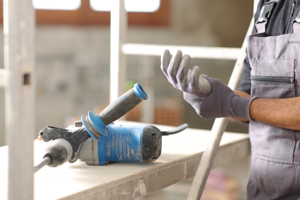 Construction worker on job site feels the effects of repetitive motion injury