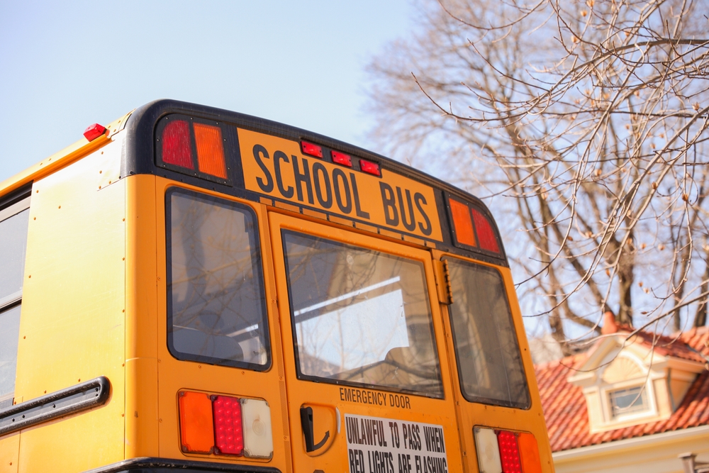 School bus parked in school drop-off zone